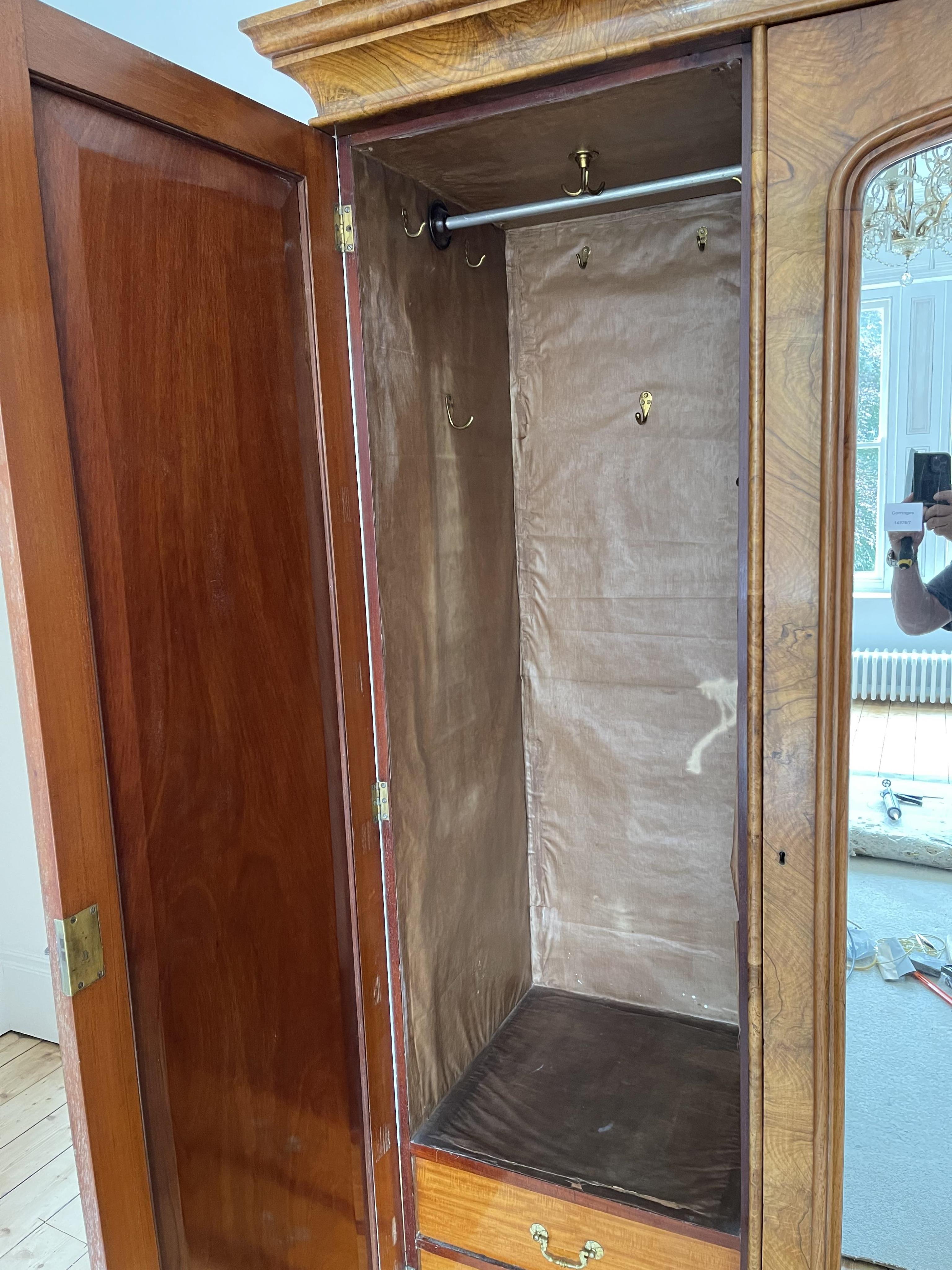 A Victorian walnut triple compactum wardrobe, width 201cm, depth 66cm, height 222cm. Condition - good
